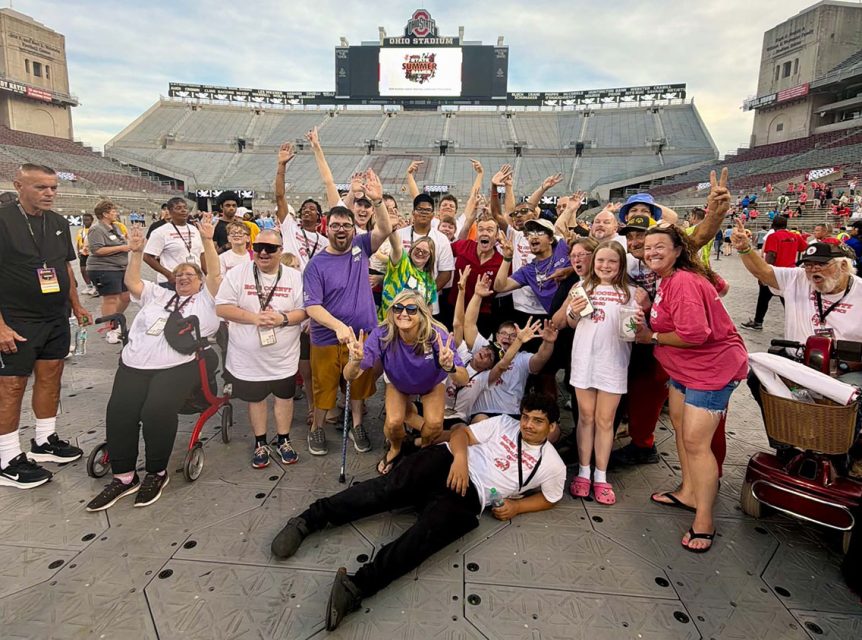 A group of Special Olympics athletes and guests at the Ohio Stadium
